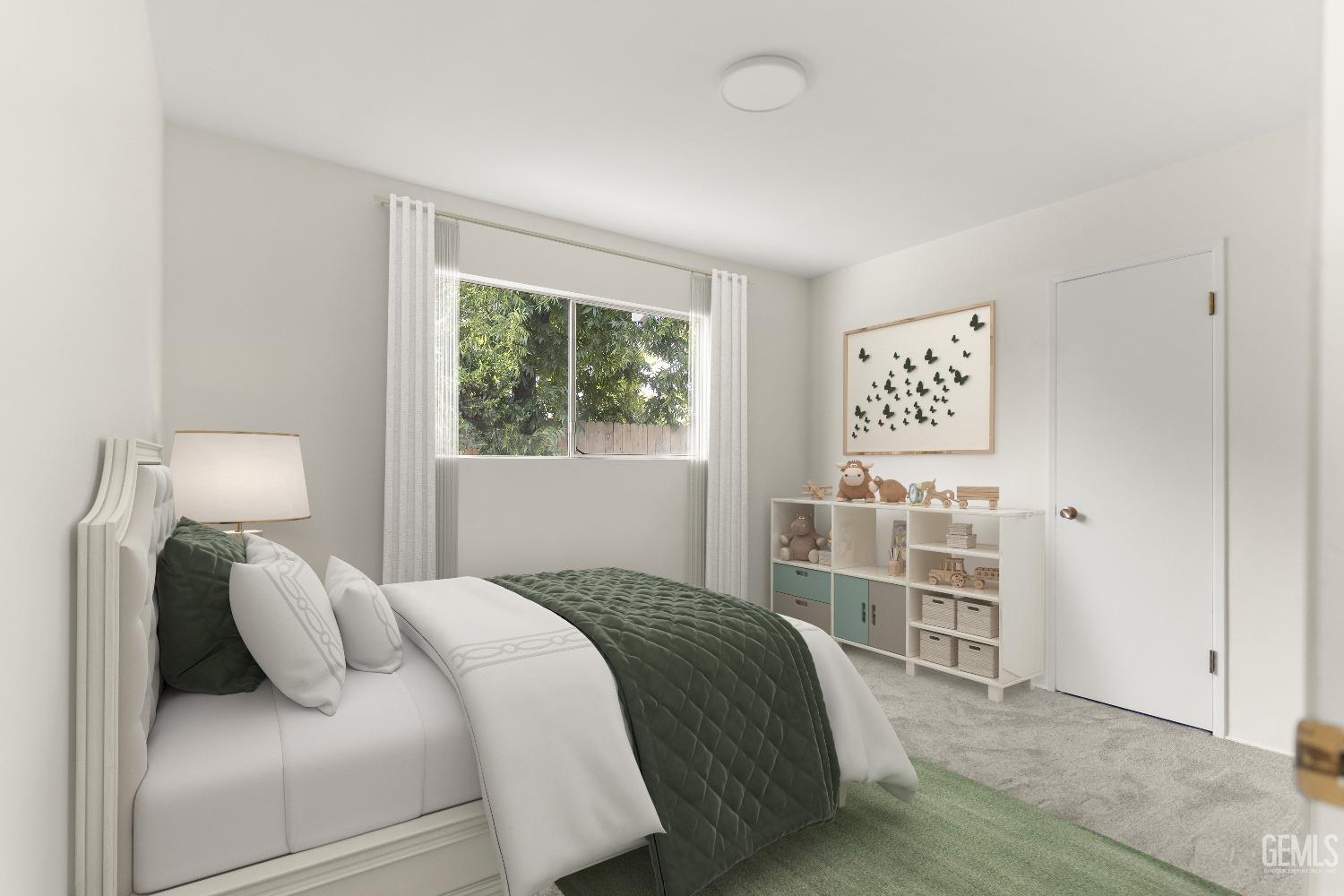 Undisclosed Address Bakersfield, CA 93309 - Photo 12 of 23 a bedroom with a bed and a cabinets