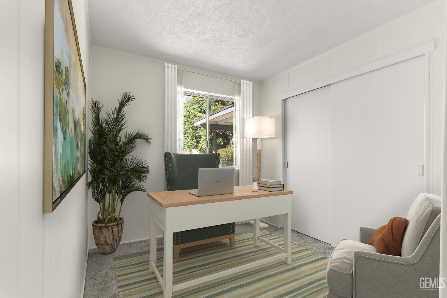 Undisclosed Address Bakersfield, CA 93309 - Photo 14 of 23 a living room with furniture and a potted plant