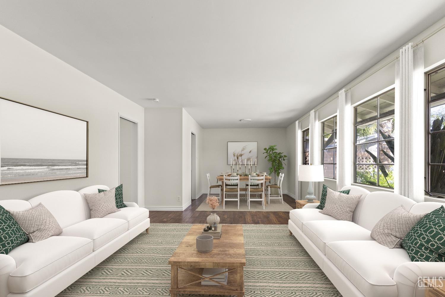 Undisclosed Address Bakersfield, CA 93309 - Photo 4 of 23 a living room with furniture and a large window