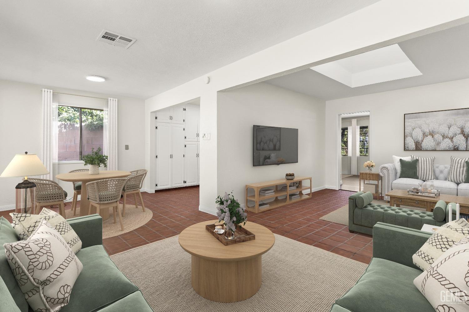 Undisclosed Address Bakersfield, CA 93309 - Photo 5 of 23 a living room with furniture and a flat screen tv