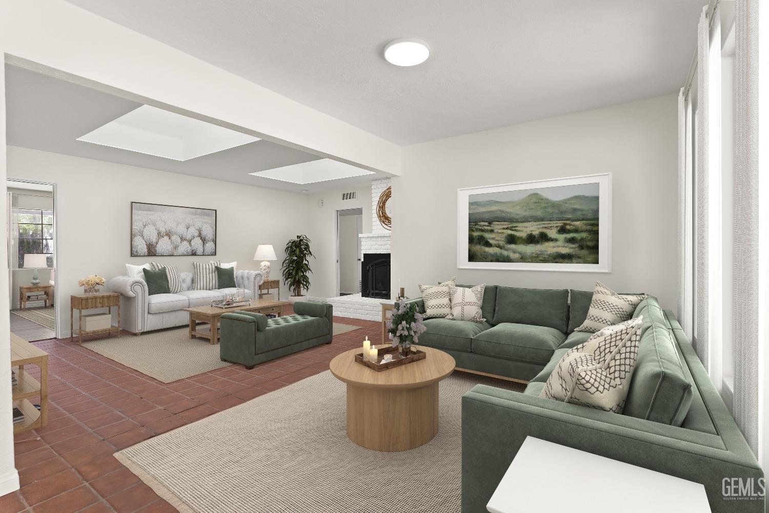 Undisclosed Address Bakersfield, CA 93309 - Photo 6 of 23 a living room with furniture and a couch