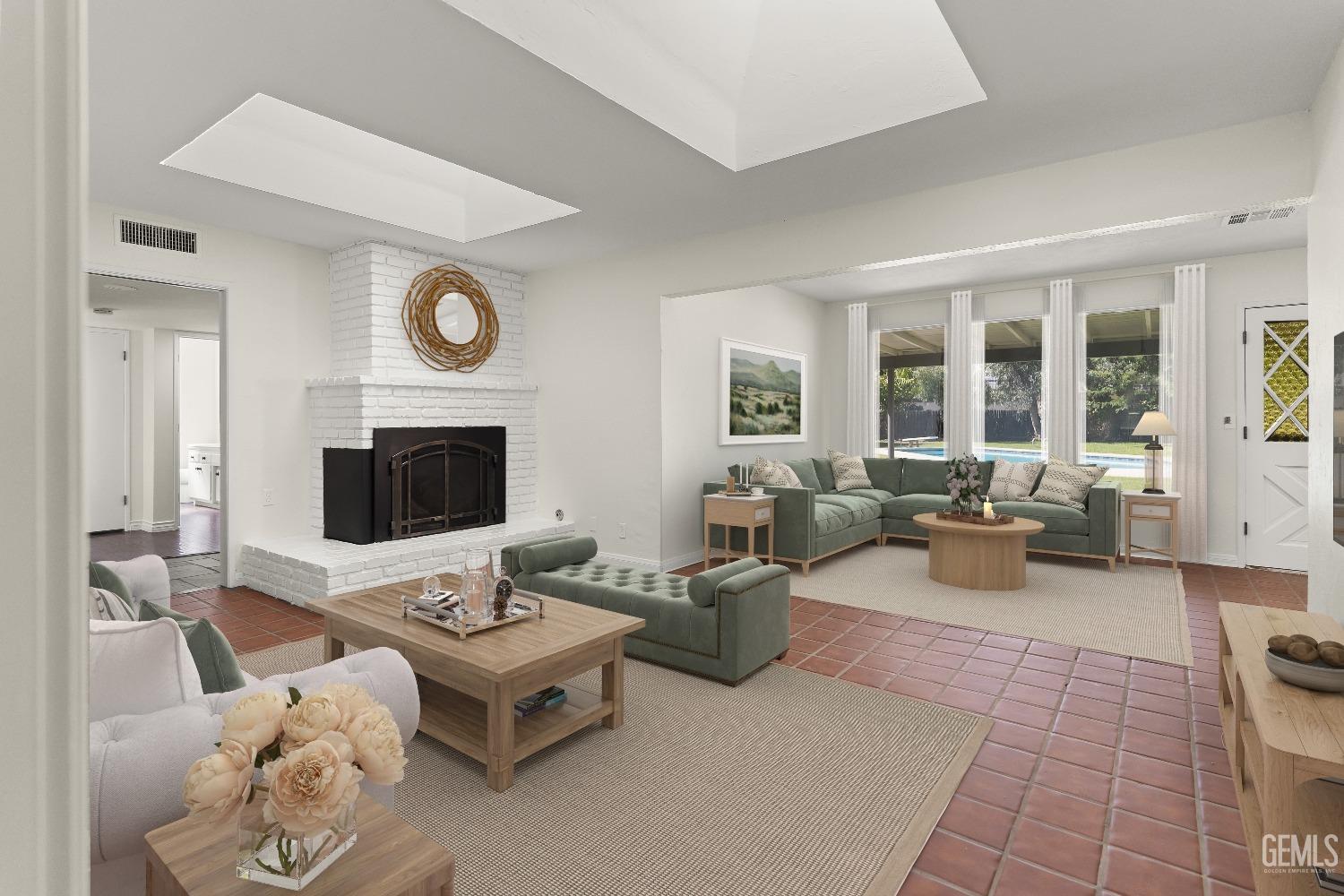 Undisclosed Address Bakersfield, CA 93309 - Photo 7 of 23 a living room with furniture and a flat screen tv