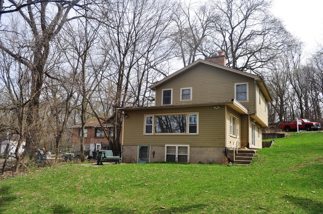 1020 Robertson Road South Elgin, IL 60177 - Photo 11 of 11 a house that is sitting in the grass