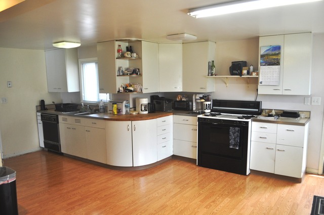 1020 Robertson Road South Elgin, IL 60177 - Photo 4 of 11 a kitchen with a white cabinets and wooden floor