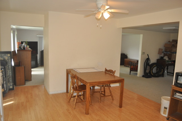 1020 Robertson Road South Elgin, IL 60177 - Photo 5 of 11 a view of a livingroom with furniture and a kitchen