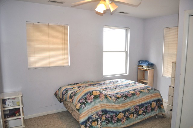 1020 Robertson Road South Elgin, IL 60177 - Photo 7 of 11 a bedroom with a bed and a window