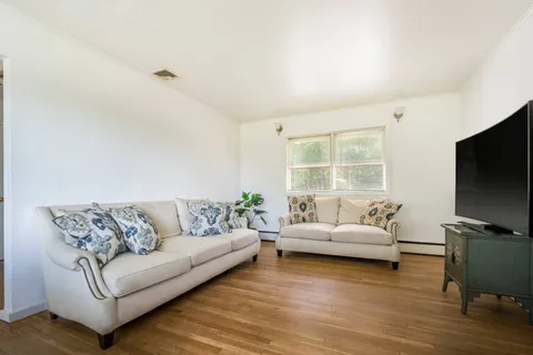 $987,000 | 27 West Side Avenue, East Quogue, NY 11942