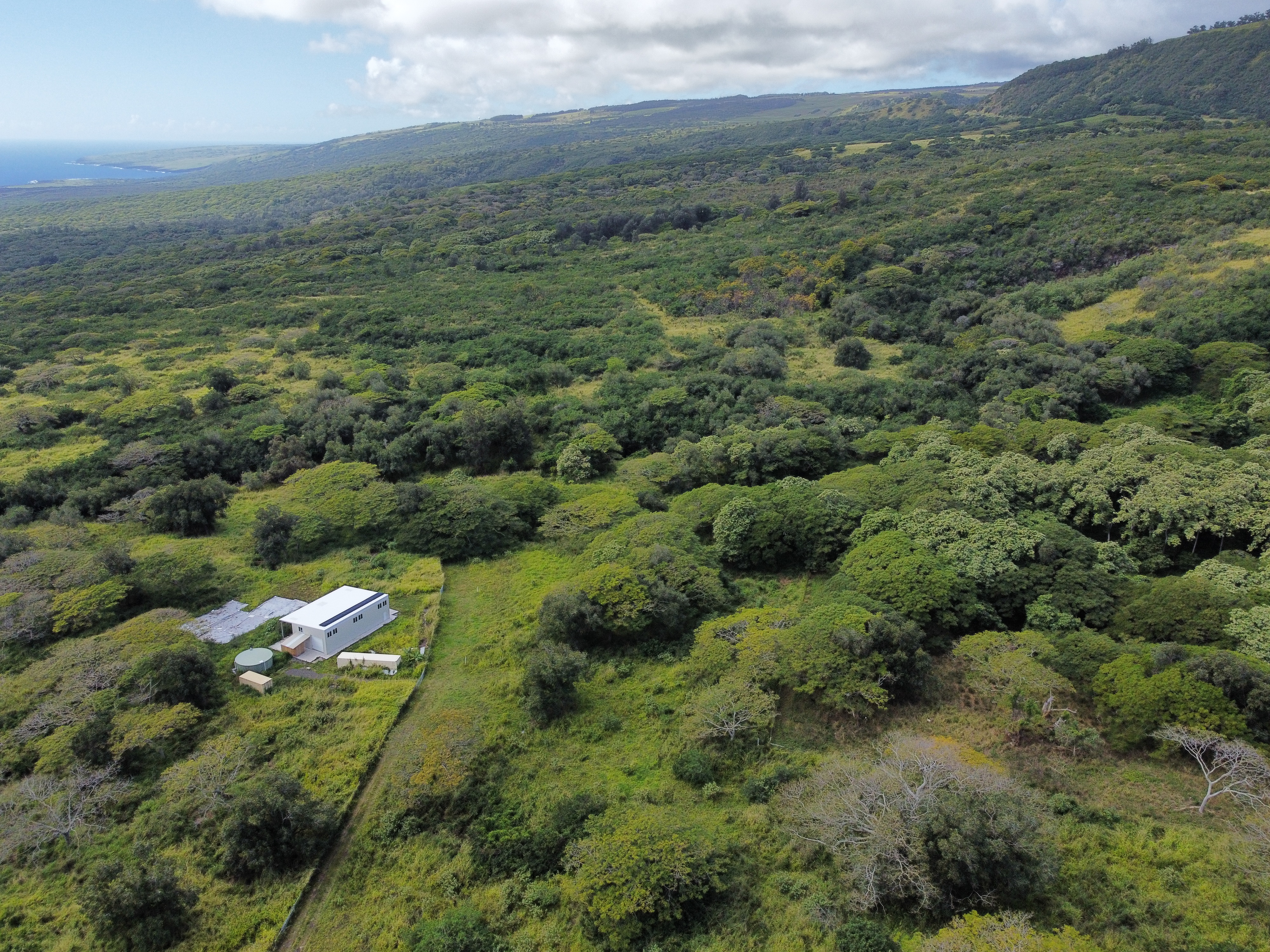 7 Lot Naalehu, HI 96772 - Photo 5 of 24 a view of a field with an ocean