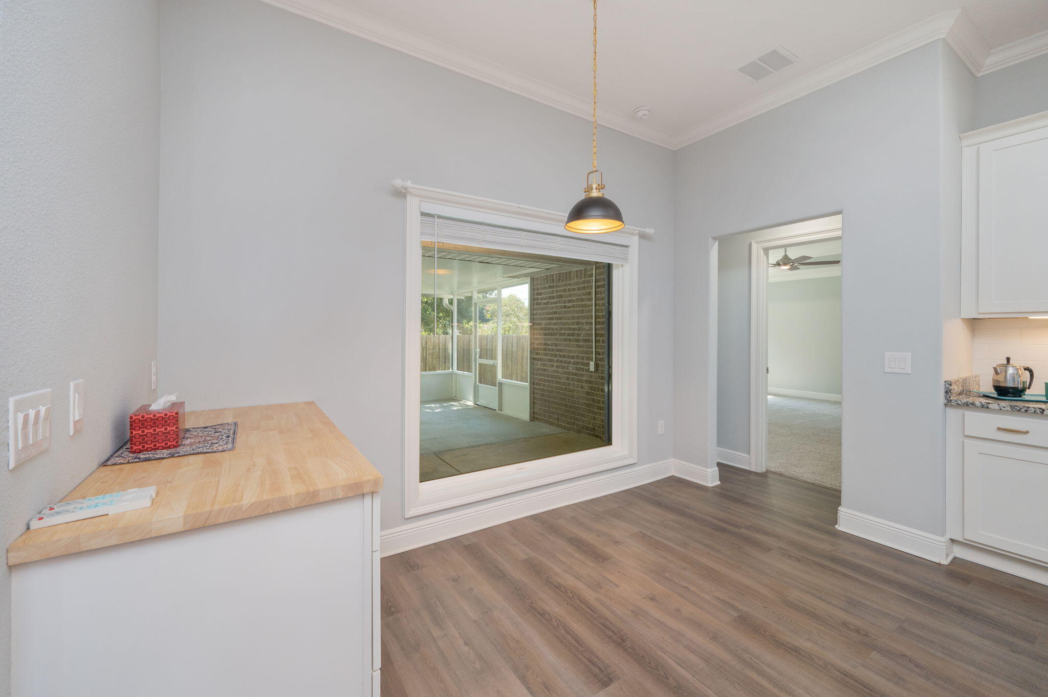6125 Quintette Road Pace, FL 32571 - Photo 30 of 71 a view of an empty room and wooden floor