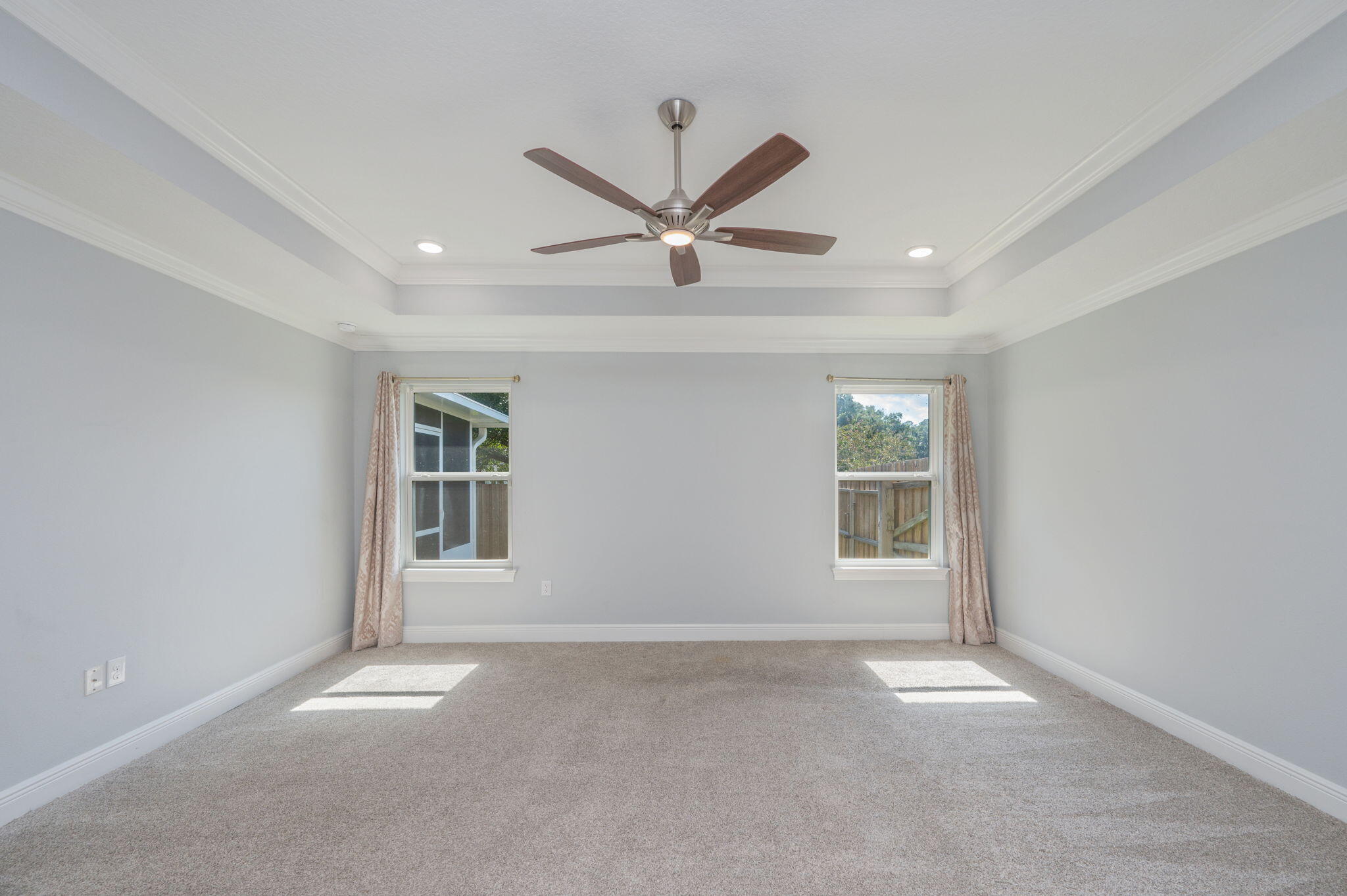 6125 Quintette Road Pace, FL 32571 - Photo 32 of 71 a view of a livingroom with a ceiling fan and window