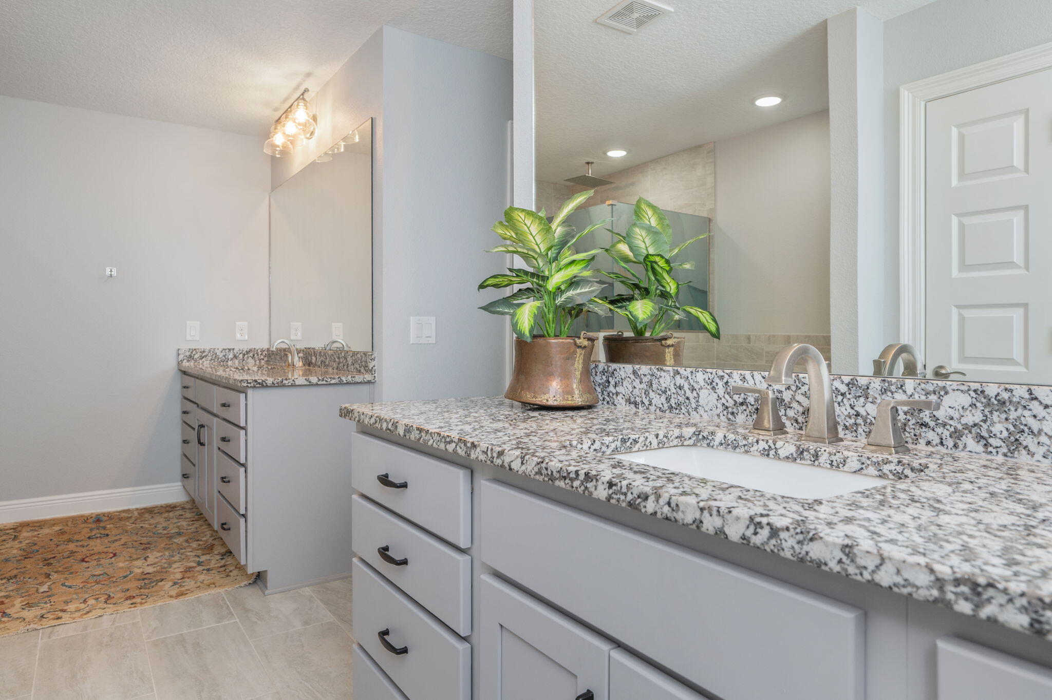 6125 Quintette Road Pace, FL 32571 - Photo 34 of 71 a bathroom with a granite countertop sink and a mirror