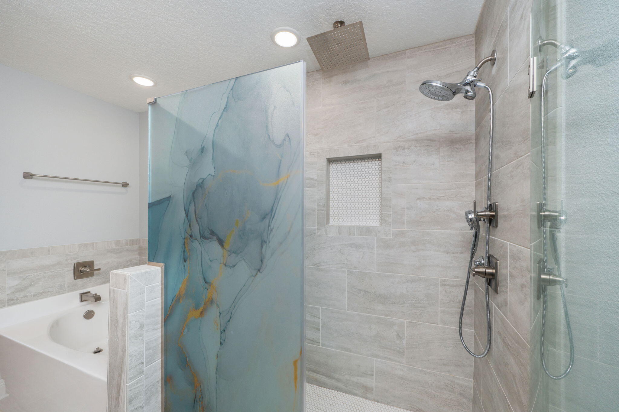 6125 Quintette Road Pace, FL 32571 - Photo 35 of 71 a bathroom with a bathtub and a shower