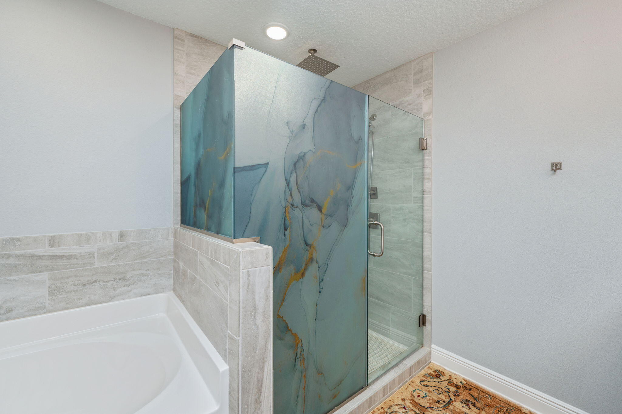 6125 Quintette Road Pace, FL 32571 - Photo 36 of 71 a bathroom with a bathtub and a shower