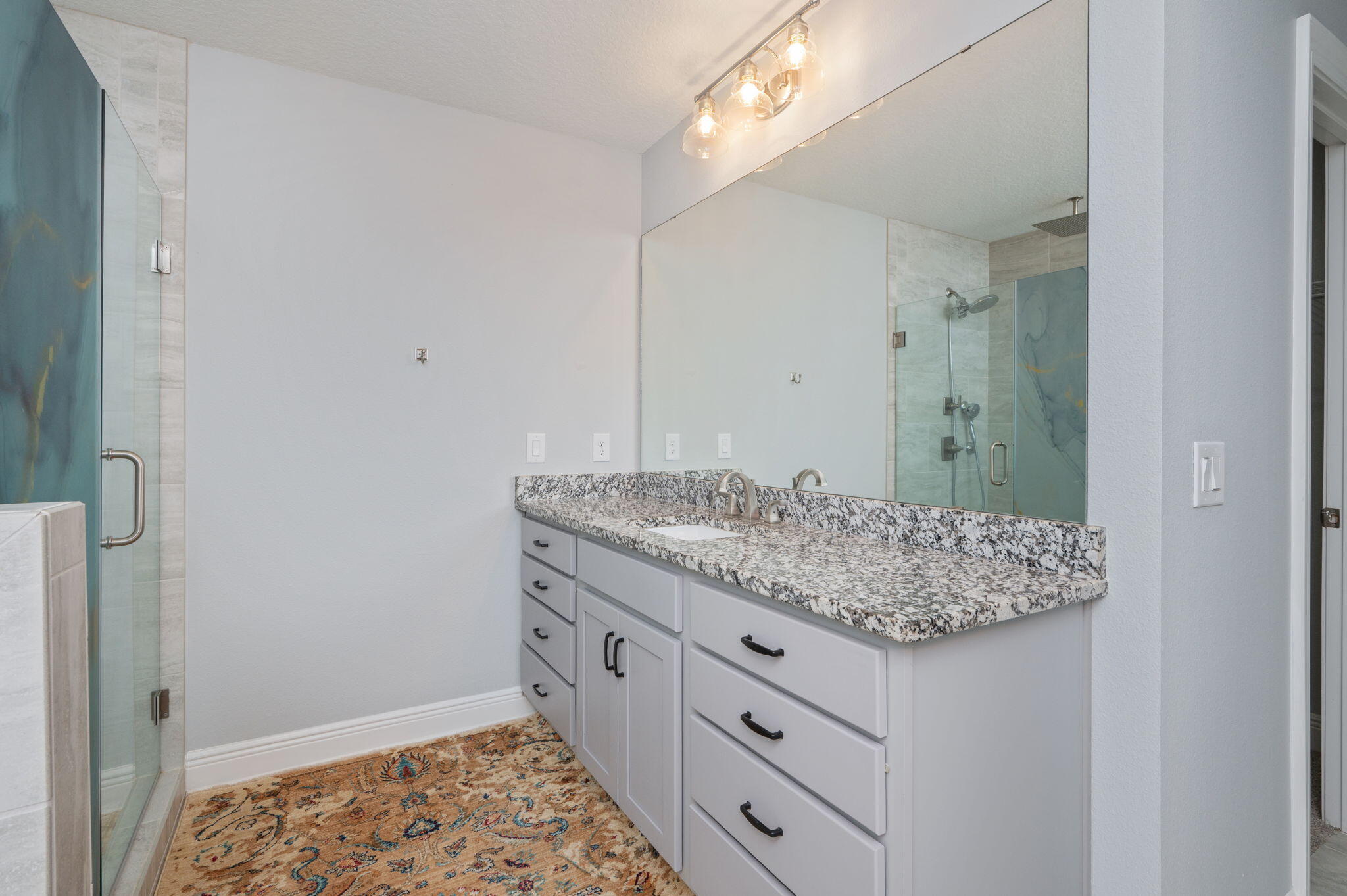 6125 Quintette Road Pace, FL 32571 - Photo 41 of 71 a bathroom with a granite countertop sink and a mirror