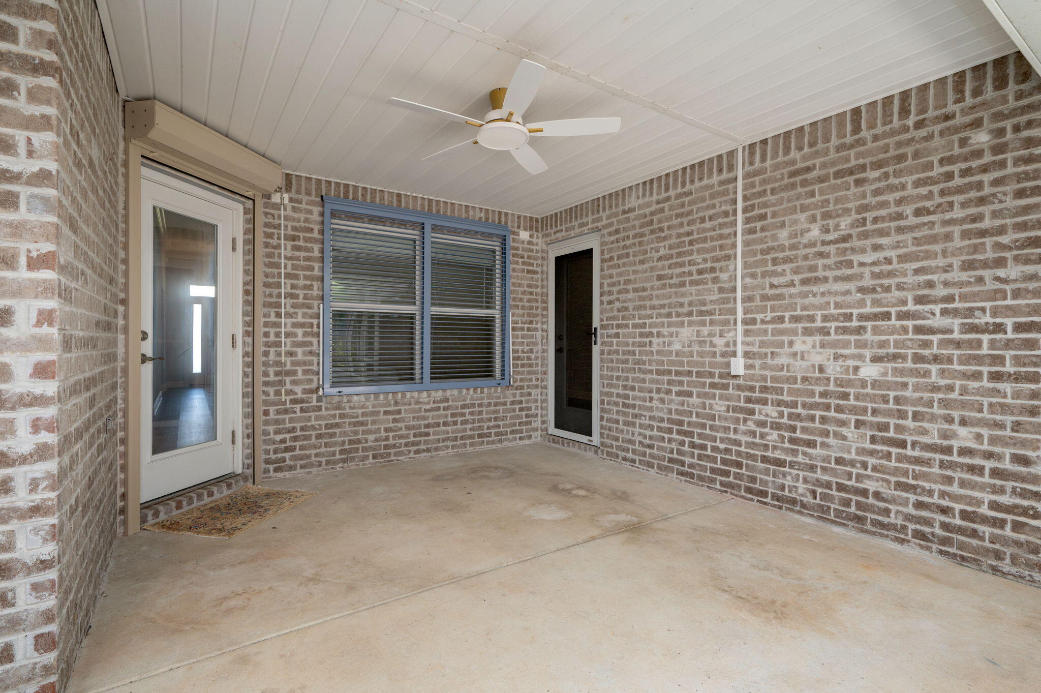 6125 Quintette Road Pace, FL 32571 - Photo 50 of 71 a view of an empty room with a ceiling fan