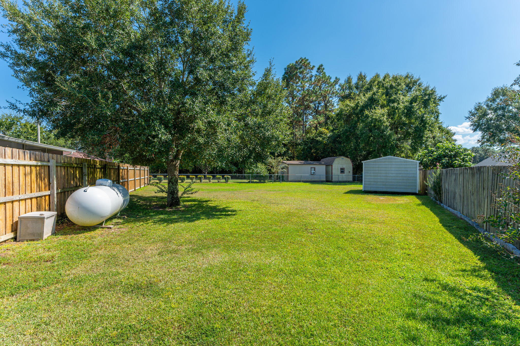 6125 Quintette Road Pace, FL 32571 - Photo 59 of 71 a view of a outdoor space and a swimming pool