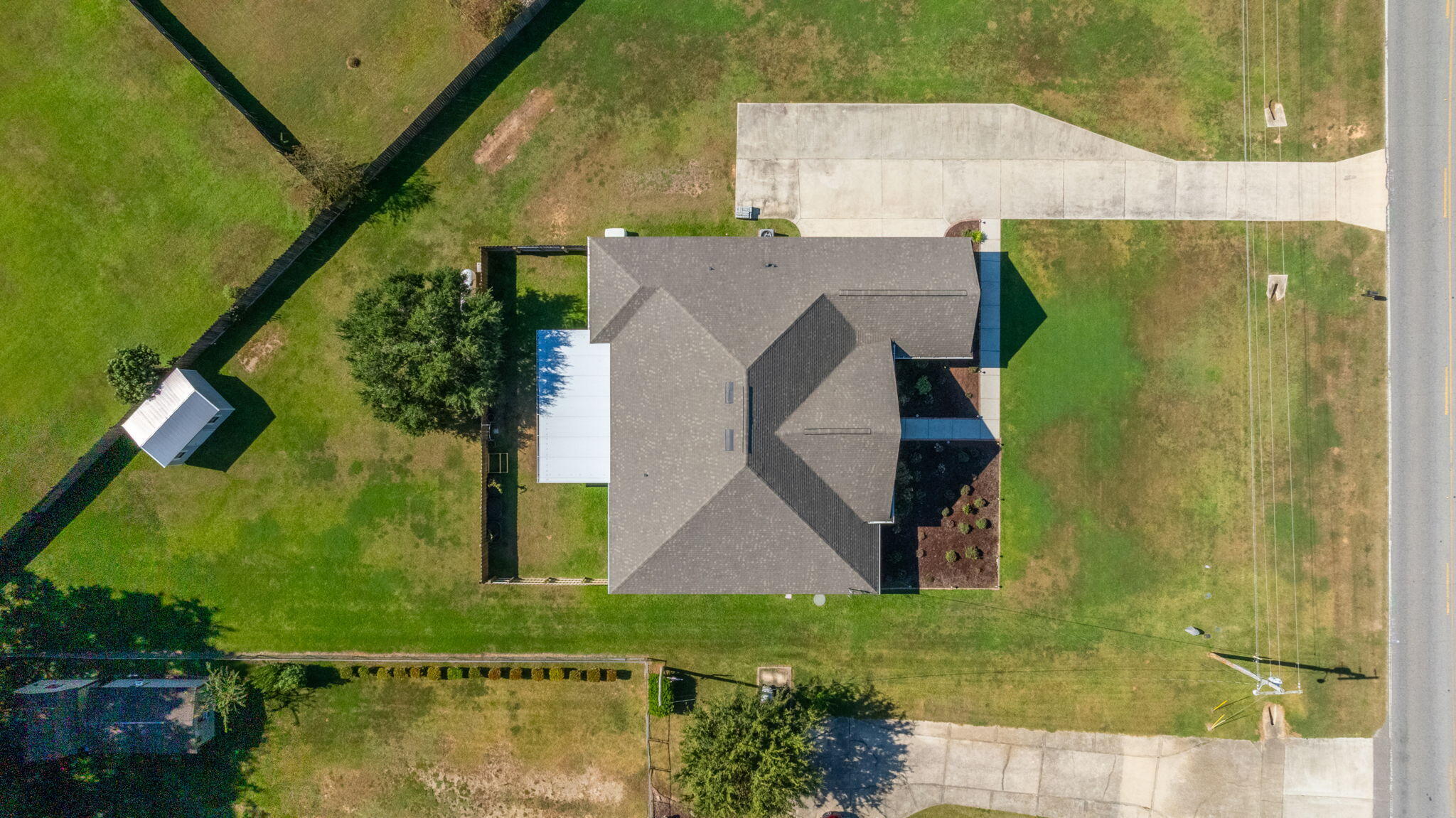 6125 Quintette Road Pace, FL 32571 - Photo 64 of 71 an aerial view of a house with a garden