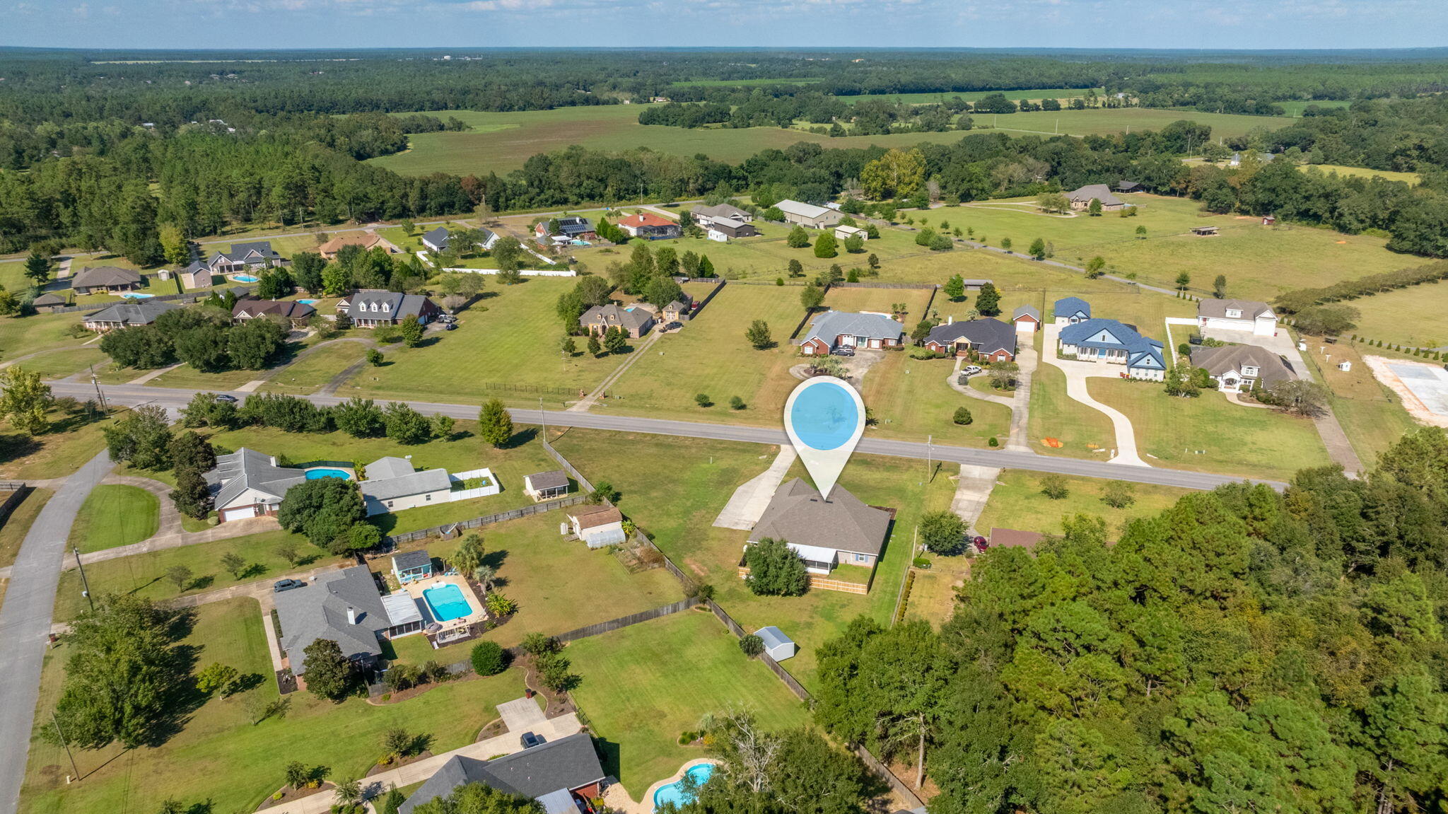 6125 Quintette Road Pace, FL 32571 - Photo 67 of 71 an aerial view of residential house with outdoor space