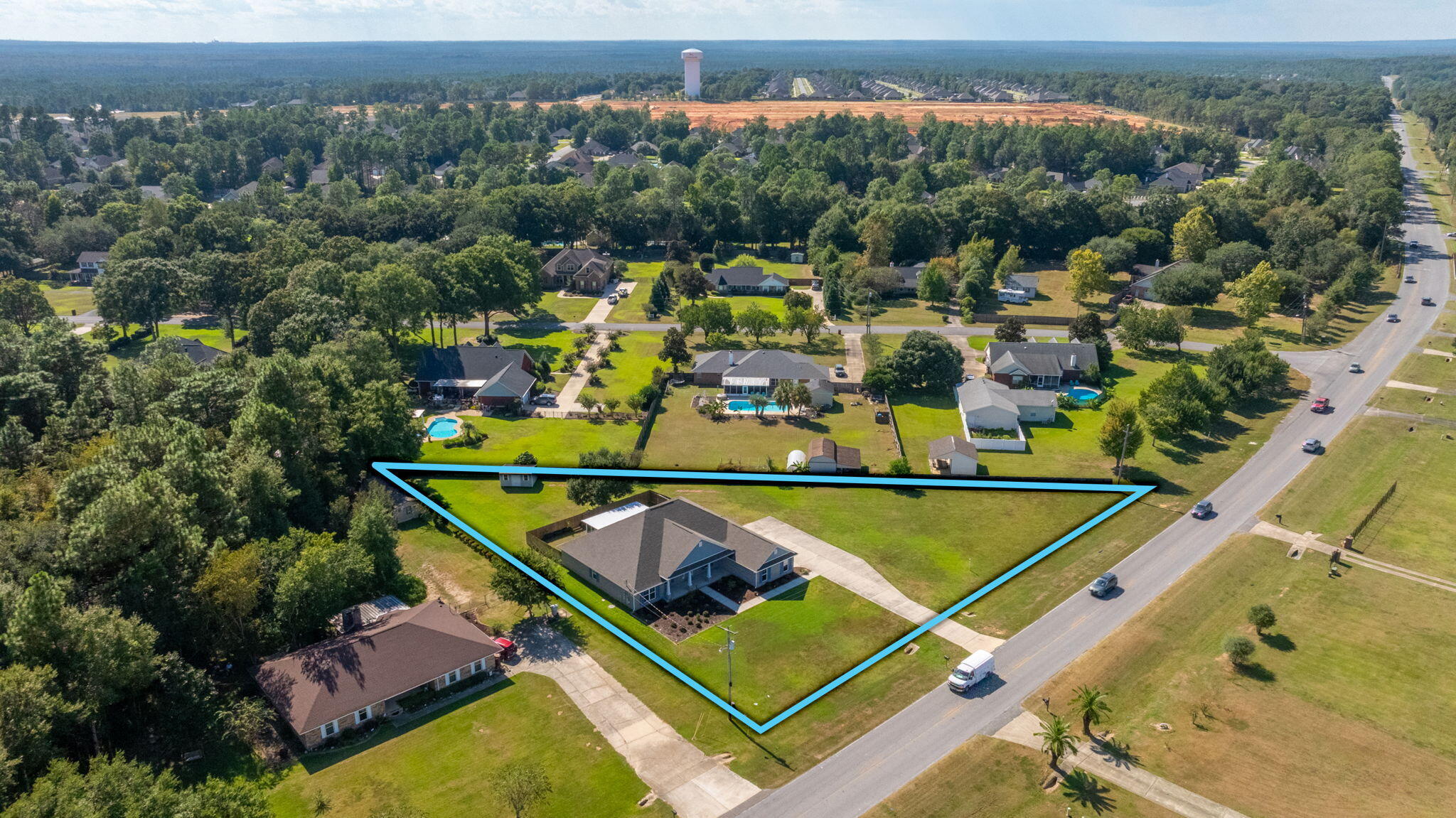 6125 Quintette Road Pace, FL 32571 - Photo 71 of 71 an aerial view of a tennis court