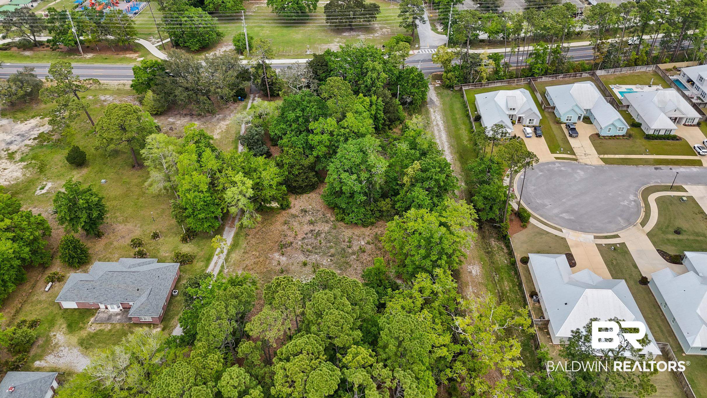 26486 Canal Road Orange Beach, AL 36561 - Photo 6 of 9 Aerial view with a residential view