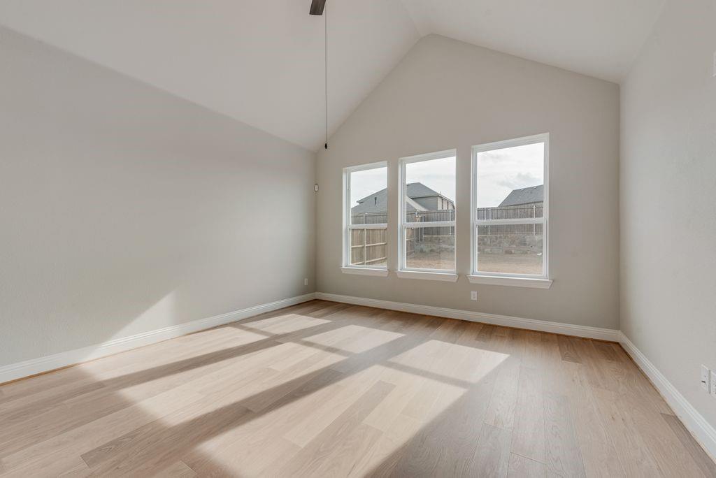 1259 Calebria Way Fate, TX 75087 - Photo 14 of 38 a view of an empty room with a window