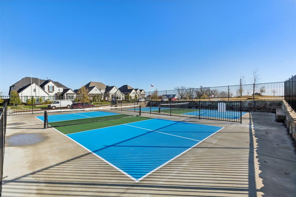1259 Calebria Way Fate, TX 75087 - Photo 37 of 38 a view of tennis court