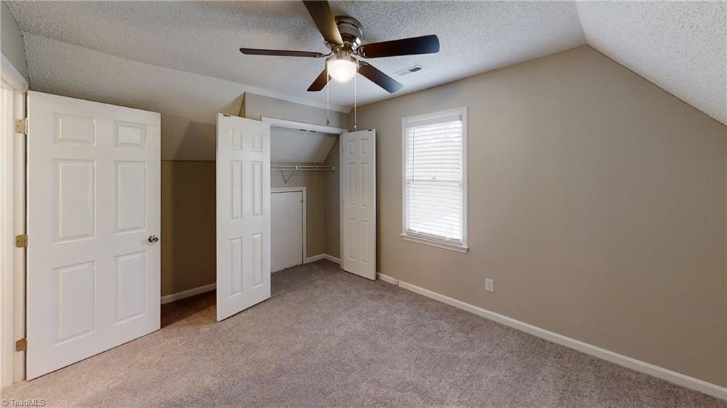 410 Shadybrook Road High Point, NC 27265 - Photo 23 of 43 Upstairs bedroom #2 with NEW paint, NEW carpet and NEW fan!