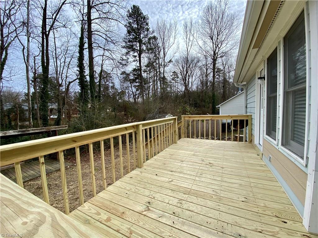 410 Shadybrook Road High Point, NC 27265 - Photo 32 of 43 NEW deck for entertaining off of the kitchen/ dining room.