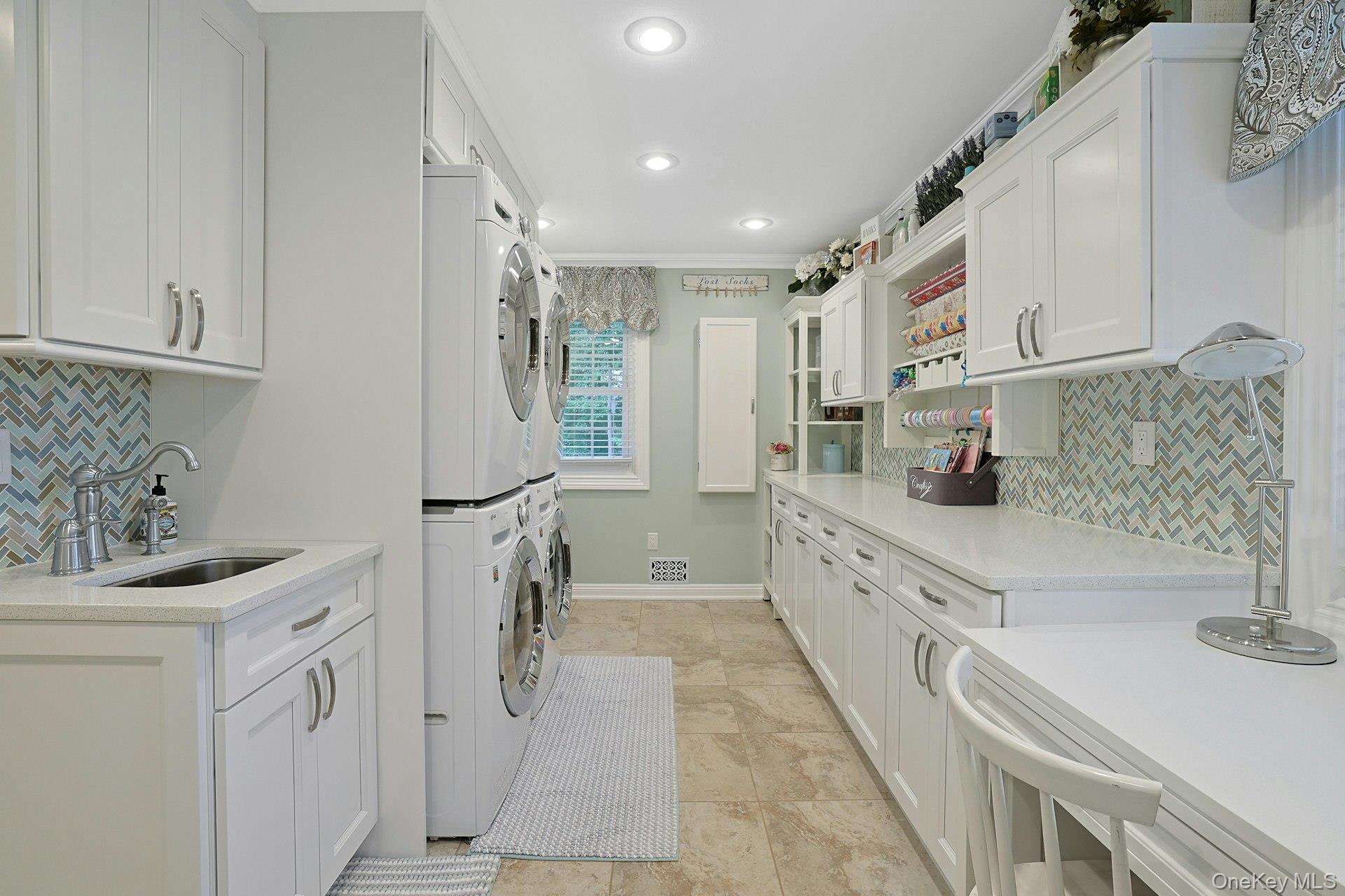 8 Dunmore Road New City, NY 10956 - Photo 21 of 48 a bathroom with a double vanity sink a mirror and shower