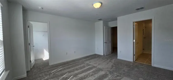 a bathroom with a bathtub shower sink and toilet