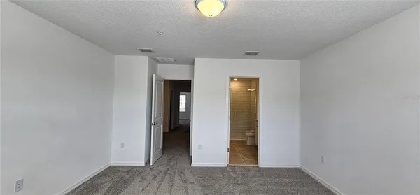 a bathroom with a double vanity sink toilet and shower