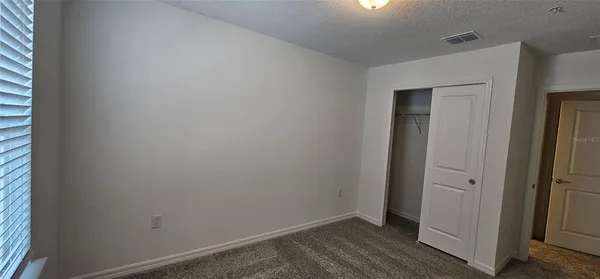 an empty room with closet