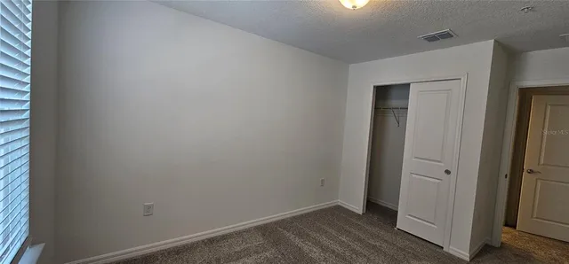 an empty room with closet