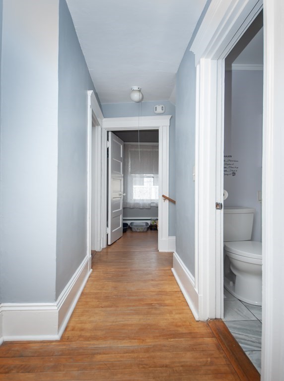 4 Fay Place Haverhill, MA 01830 - Photo 12 of 25 a view of a hallway with a livingroom and bathroom