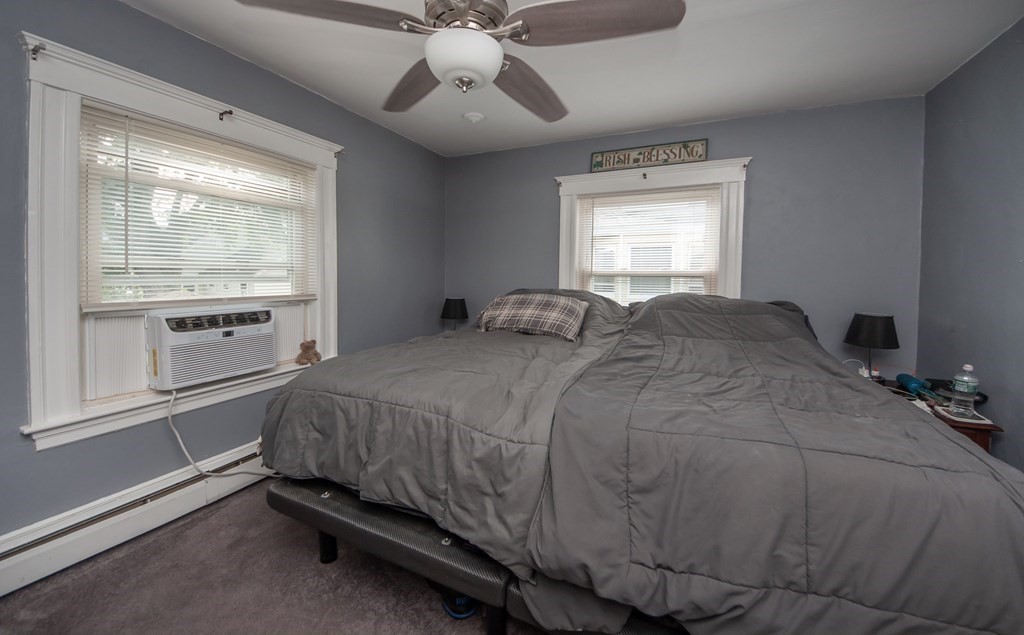 4 Fay Place Haverhill, MA 01830 - Photo 18 of 25 a bedroom with a bed and a window