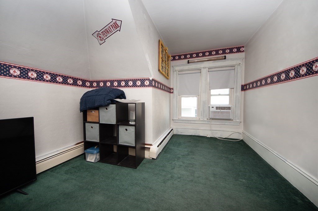 4 Fay Place Haverhill, MA 01830 - Photo 20 of 25 a view of a room with window and furniture