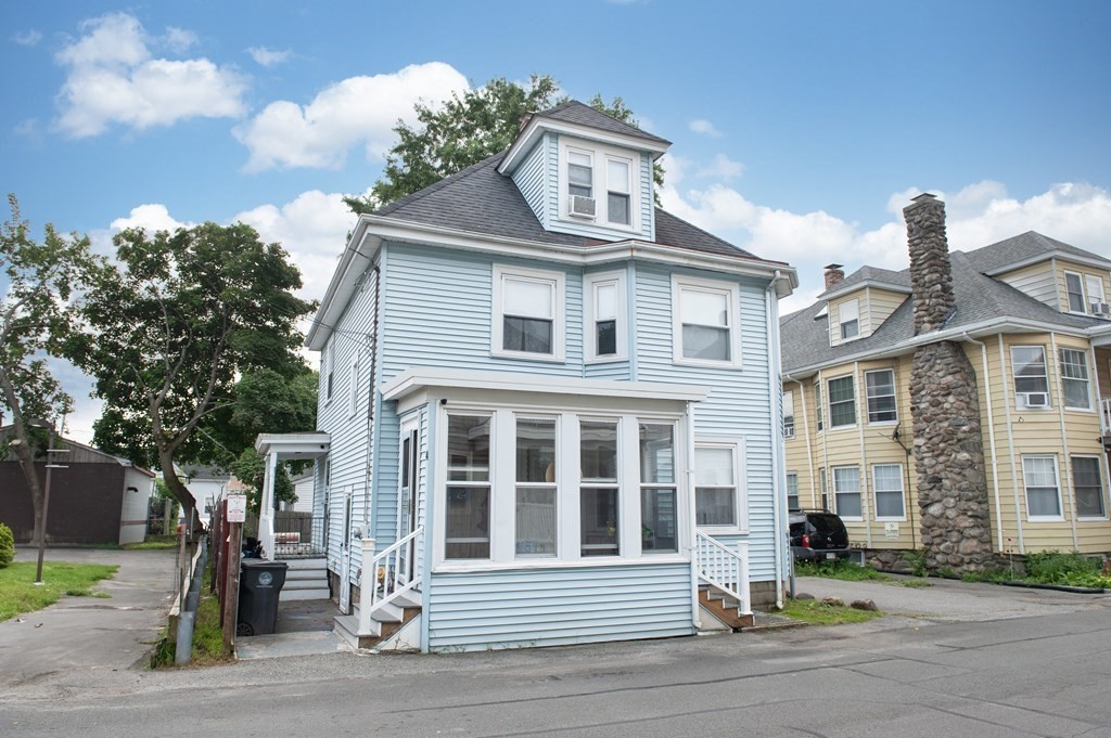 4 Fay Place Haverhill, MA 01830 - Photo 2 of 25 a front view of a house with a yard