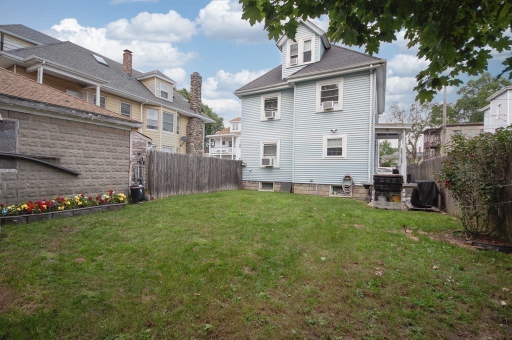 4 Fay Place Haverhill, MA 01830 - Photo 21 of 25 a front view of house with yard and green space