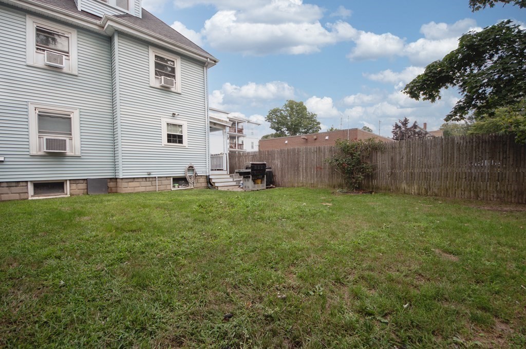 4 Fay Place Haverhill, MA 01830 - Photo 22 of 25 a view of a house with a yard and sitting area