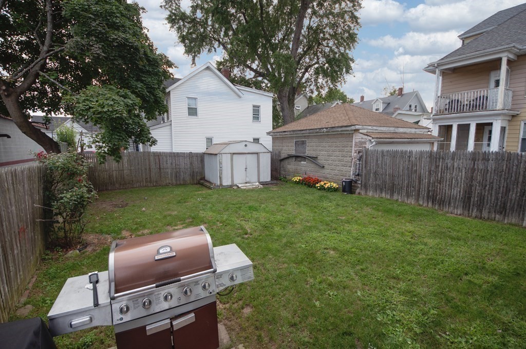4 Fay Place Haverhill, MA 01830 - Photo 23 of 25 a view of a house with a yard and sitting area