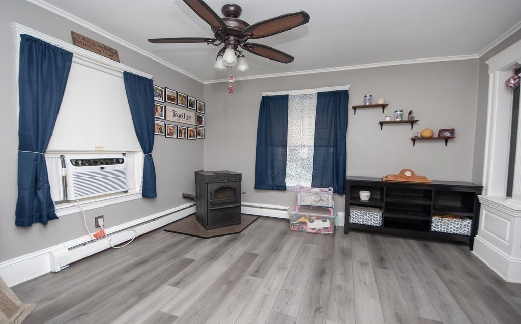 4 Fay Place Haverhill, MA 01830 - Photo 9 of 25 a living room with furniture and a wooden floor