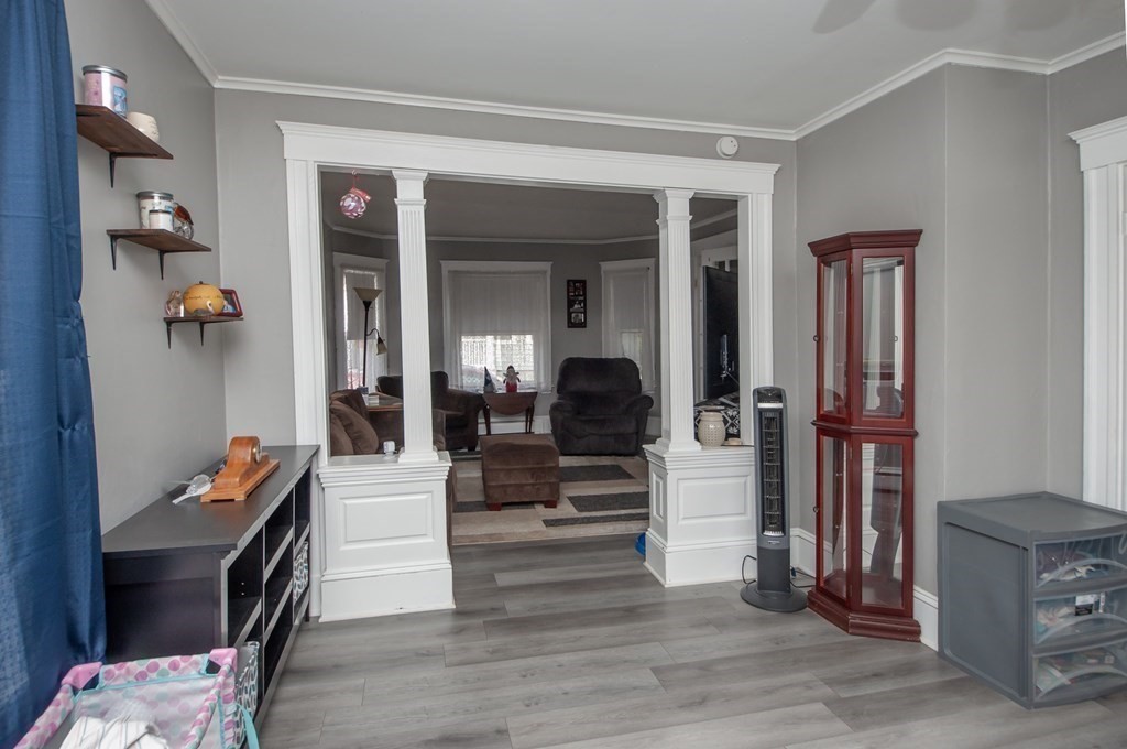4 Fay Place Haverhill, MA 01830 - Photo 10 of 25 a living room with furniture and a wooden floor