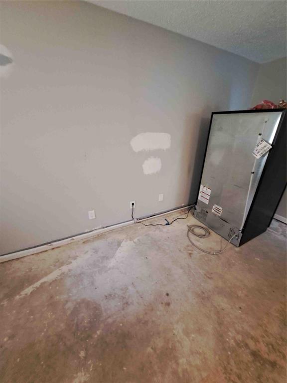 321 Christie Avenue Everman, TX 76140 - Photo 7 of 8 an empty room with an empty space and sink