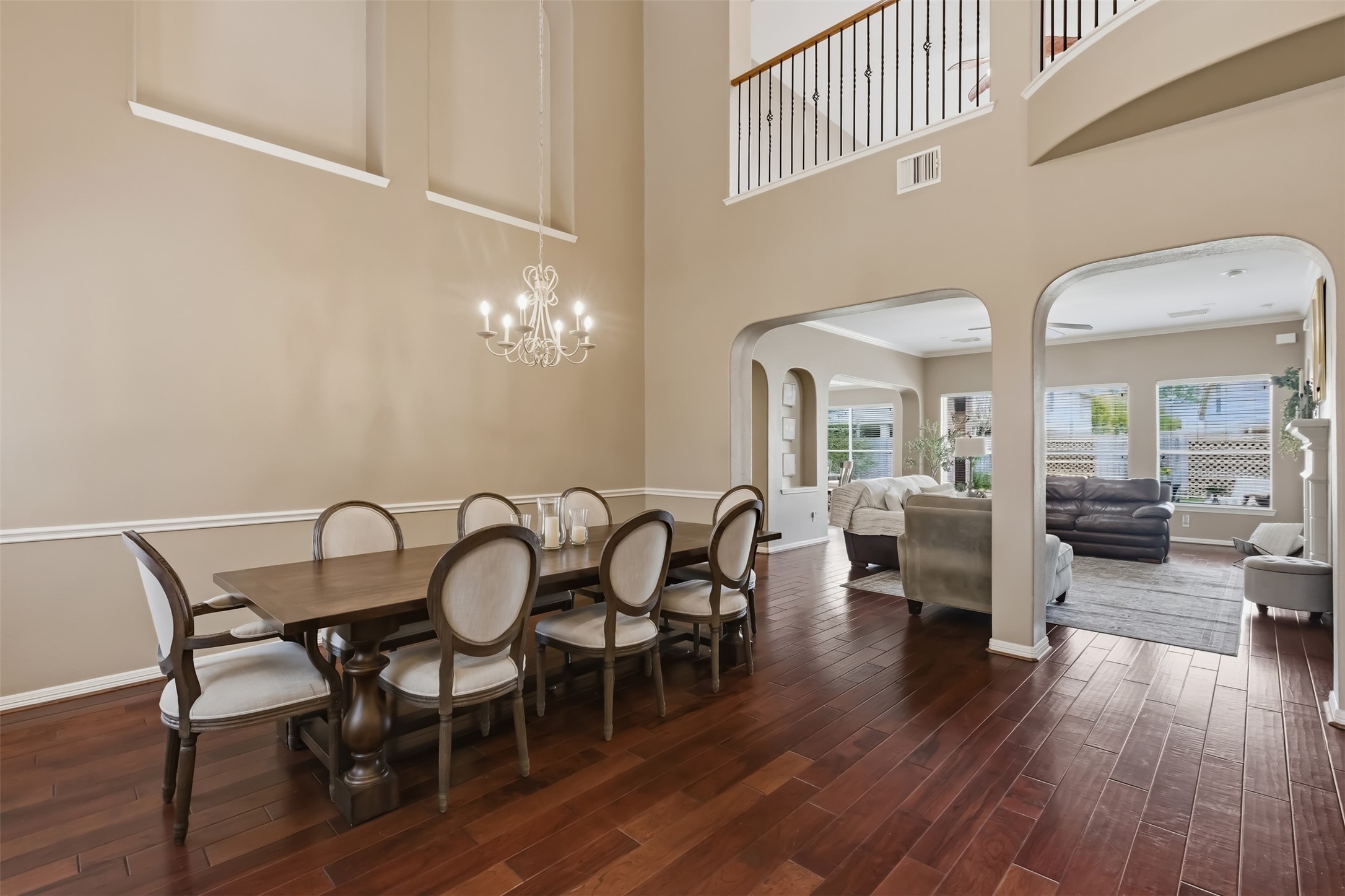 20722 Windrose Bend Drive Spring, TX 77379 - Photo 12 of 50 This inviting two-story brick home features a spacious three-car garage, a well-maintained front yard with mature trees, and a large driveway. Ideal for family living in a peaceful neighborhood.
