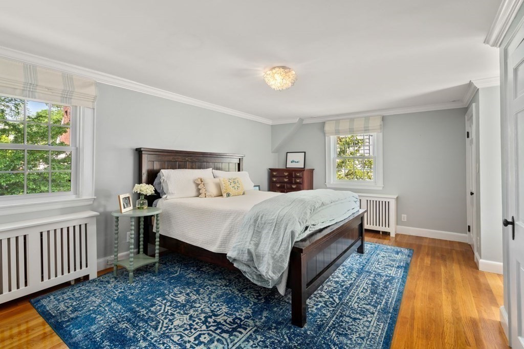 115 Bright Road Belmont, MA 02478 - Photo 12 of 22 a bed sitting in a bedroom next to a window