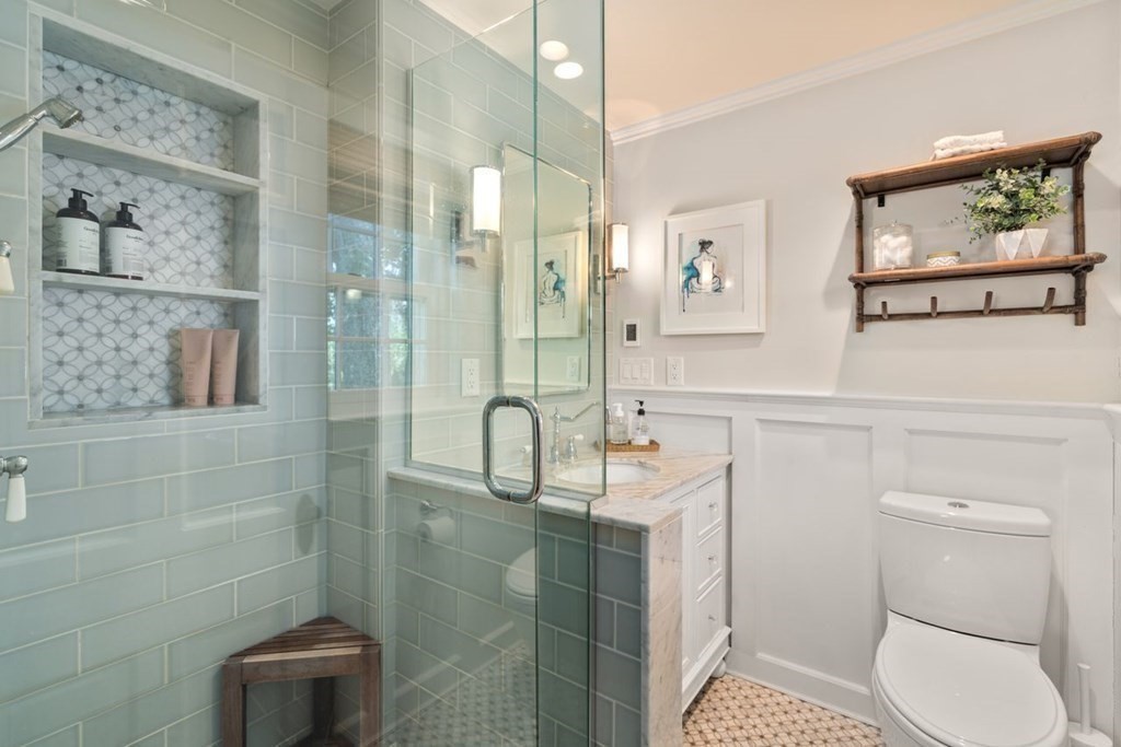 115 Bright Road Belmont, MA 02478 - Photo 13 of 22 a bathroom with a sink a toilet and shower