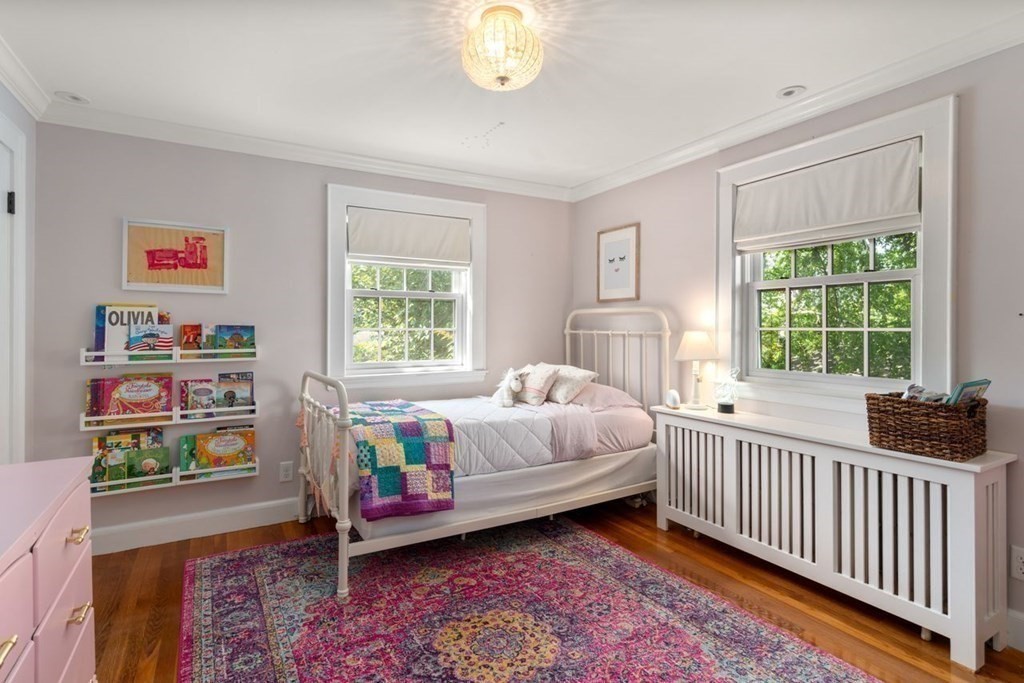 115 Bright Road Belmont, MA 02478 - Photo 15 of 22 a bedroom with a bed and a window