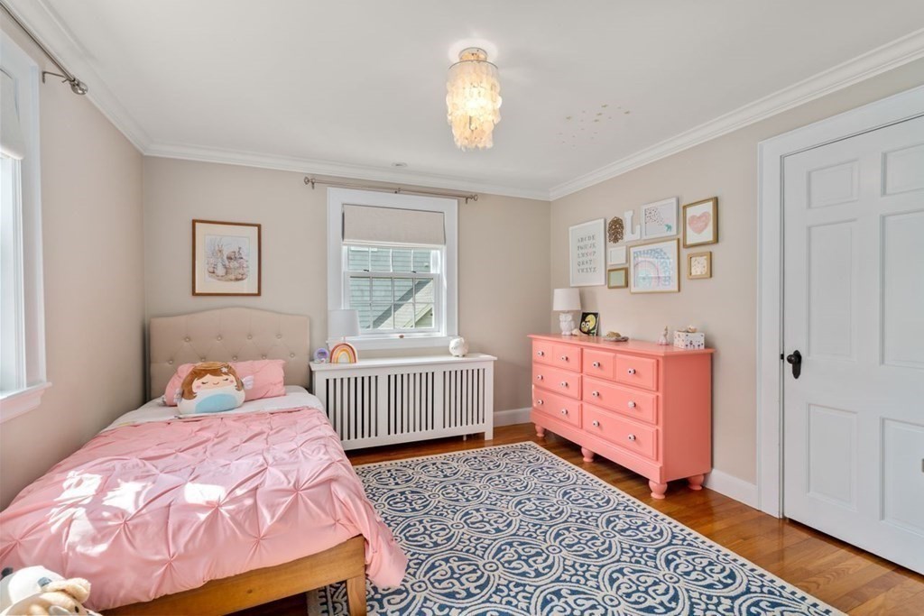 115 Bright Road Belmont, MA 02478 - Photo 16 of 22 a bedroom with a bed and a dresser in it