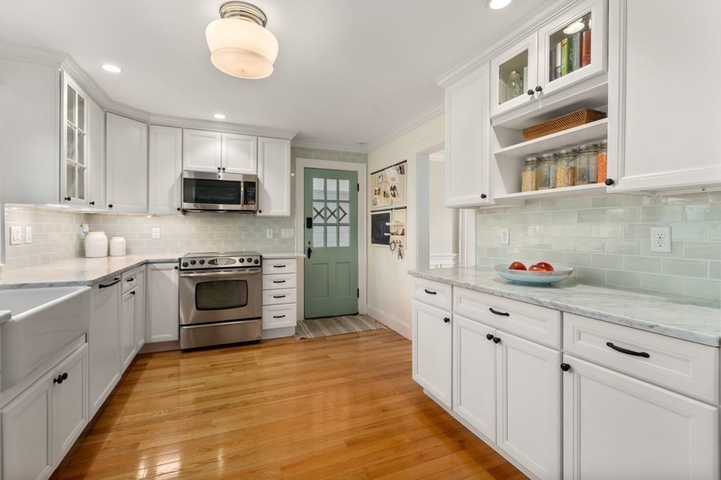 115 Bright Road Belmont, MA 02478 - Photo 7 of 22 a kitchen with cabinets a sink and appliances