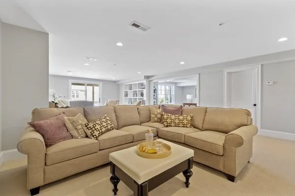 a living room with furniture and a couch